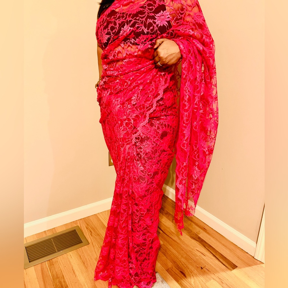 Dainty yet elegant magnet/fuchsia lace saree with beautiful floral lace